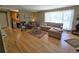 Spacious living room with hardwood floors, large windows and comfortable seating arrangement at 1245 S Forest St, Denver, CO 80246