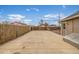 Spacious concrete backyard with wood fence at 235 N 7Th Ave, Brighton, CO 80601