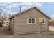 Siding on the exterior, showing the back corner of the home at 235 N 7Th Ave, Brighton, CO 80601