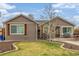 Charming single story home featuring a neatly landscaped front yard and a cozy exterior at 235 N 7Th Ave, Brighton, CO 80601