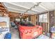 Spacious garage with storage solutions, a workbench, and room for a vehicle at 235 N 7Th Ave, Brighton, CO 80601