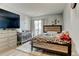 Cozy bedroom with hardwood floors, large window, and a closet at 8600 E Alameda Ave # 17-105, Denver, CO 80247