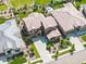 Stunning aerial view showcasing the home's landscaping, surrounding neighborhood, and convenient street access at 2130 S Poppy St, Lakewood, CO 80228