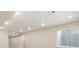 Finished basement featuring recessed lighting, neutral paint, and a window for natural light at 2130 S Poppy St, Lakewood, CO 80228