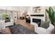 Cozy living room with fireplace and modern decor, perfect for relaxation and unwinding at 2130 S Poppy St, Lakewood, CO 80228