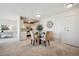 Cozy dining area with table, chairs, and adjacent kitchen in a well-lit and inviting space at 7801 W 35Th Ave # 405, Wheat Ridge, CO 80033