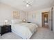 Inviting bedroom featuring neutral tones, plush carpet, and an ensuite bathroom at 7801 W 35Th Ave # 405, Wheat Ridge, CO 80033