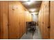 Hallway of wooden storage lockers with metal carts, perfect for organizing belongings at 7801 W 35Th Ave # 405, Wheat Ridge, CO 80033