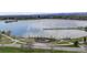 Beautiful aerial view of a large lake surrounded by green parks and walking paths at 7160 W 24Th Ave, Lakewood, CO 80214