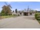 Well-maintained single-story home featuring a spacious driveway and beautifully landscaped front yard at 7160 W 24Th Ave, Lakewood, CO 80214