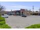 Commercial property with a colorful UK cafe and convenient parking for patrons at 7160 W 24Th Ave, Lakewood, CO 80214