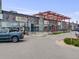 Modern commercial building with a Tamale Kitchen and Cafe under a bold metal canopy at 7160 W 24Th Ave, Lakewood, CO 80214