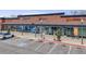 Modern commercial storefronts include GNC, Bellco, Crumbl Cookies, and Orangetheory Fitness at 7160 W 24Th Ave, Lakewood, CO 80214