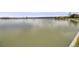 Calm lake view reflecting the sky, showcasing the beautiful waterfront scenery at 7160 W 24Th Ave, Lakewood, CO 80214