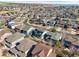 Scenic aerial view showcasing a vibrant neighborhood with well-maintained houses at 26890 E Roxbury Pl, Aurora, CO 80016