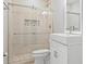 This bathroom features a stand-up shower, modern vanity, and neutral tones at 26890 E Roxbury Pl, Aurora, CO 80016