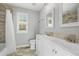 This bathroom offers a double sink vanity, tile flooring, and bright light at 26890 E Roxbury Pl, Aurora, CO 80016