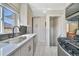 Bright kitchen featuring stainless steel appliances, a modern sink, and ample counter space at 771 S Dale Ct, Denver, CO 80219