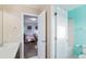 Shared bathroom with access from two bedrooms at 21093 E Hampden Pl, Aurora, CO 80013