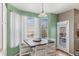 Kitchen dining area with table and chairs, offering scenic views at 21093 E Hampden Pl, Aurora, CO 80013