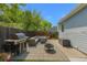 Backyard with patio, grill, seating, and fire pit area, perfect for outdoor gatherings at 17616 Ponderosa Ave, Parker, CO 80134