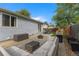 Backyard with patio featuring a fire pit, patio seating, and a grill at 17616 Ponderosa Ave, Parker, CO 80134