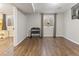 Basement with hardwood floors, natural light, and equipment for exercise at 17616 Ponderosa Ave, Parker, CO 80134