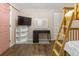 A bright bedroom with a bunk bed, desk and television, perfect for or guests at 17616 Ponderosa Ave, Parker, CO 80134
