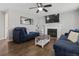 Comfortable living room featuring a fireplace and modern furnishings at 17616 Ponderosa Ave, Parker, CO 80134