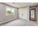 Bright bedroom with window and closet provides comfort at 7400 S Genoa Cir, Centennial, CO 80016