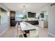 Modern kitchen with sleek cabinetry, quartz countertops, and stainless steel appliances at 7400 S Genoa Cir, Centennial, CO 80016