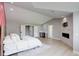 Spacious main bedroom with fireplace, wood-look floors, minibar and bright, natural light at 7400 S Genoa Cir, Centennial, CO 80016
