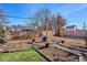 Outdoor backyard space with potential for landscaping, featuring a grill and decorative lighting fixtures at 1770 S Yuma St, Denver, CO 80223