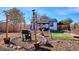 Backyard featuring a covered patio, seating, and a BBQ grill at 1770 S Yuma St, Denver, CO 80223