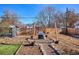 A backyard featuring landscaping possibilities and decorative lighting at 1770 S Yuma St, Denver, CO 80223