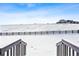 View from deck looks out over snow covered backyard and pasture at 3340 Backdrop Ct, Castle Rock, CO 80108