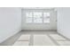 Bedroom with carpet and large windows overlooking a snowy scene at 3340 Backdrop Ct, Castle Rock, CO 80108