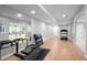 Finished basement featuring open gym, recessed lighting, and laminate floors at 920 Shady Oak Ln, Castle Pines, CO 80108