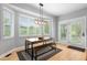 Bright breakfast nook features plenty of natural light, clean design, and views to the outdoors at 920 Shady Oak Ln, Castle Pines, CO 80108