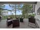 Outdoor patio with seating area overlooking the forest at 8045 Eagle Rd, Larkspur, CO 80118