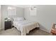 Basement bedroom with double bed and nightstand at 3433 E Costilla Ave, Centennial, CO 80122