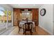 Kitchen dining area with built-in cabinetry and backyard access at 3433 E Costilla Ave, Centennial, CO 80122