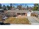 Brick ranch home with attached garage and landscaped yard at 3433 E Costilla Ave, Centennial, CO 80122