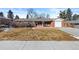 Brick ranch home with attached garage and landscaped yard at 3433 E Costilla Ave, Centennial, CO 80122