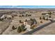 A two-story home with an attached garage, nestled in a semi-arid landscape with mountain views at 3441 Medallion Rd, Castle Rock, CO 80104