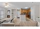 Bright, open living space with fireplace, and stainless steel appliances at 10437 W Hampden Ave # 104, Lakewood, CO 80227