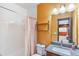 Basement bathroom with granite countertop and shower/tub combo at 5731 Boston Ct, Denver, CO 80238