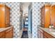 Elegant bathroom with double vanity and walk-in shower at 5731 Boston Ct, Denver, CO 80238