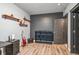 Basement bedroom with wood-look floors and built-in shelving at 5731 Boston Ct, Denver, CO 80238