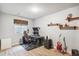 Basement bedroom with gaming setup and built-in shelving at 5731 Boston Ct, Denver, CO 80238